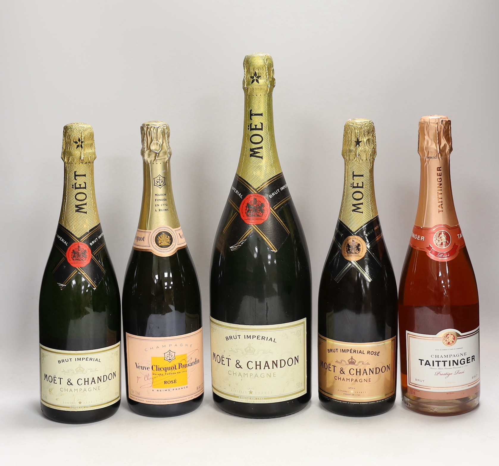 Five bottles of champagne, including a magnum of Moët & Chandon